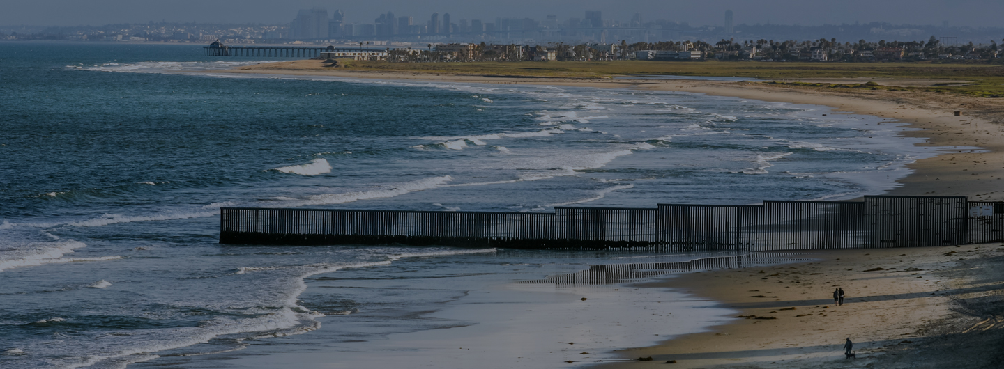 San Diego and Tijuana board fence in ocean
