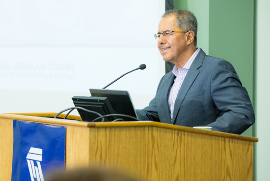 Photo of Rafael Fernández de Castro speaking at a podium